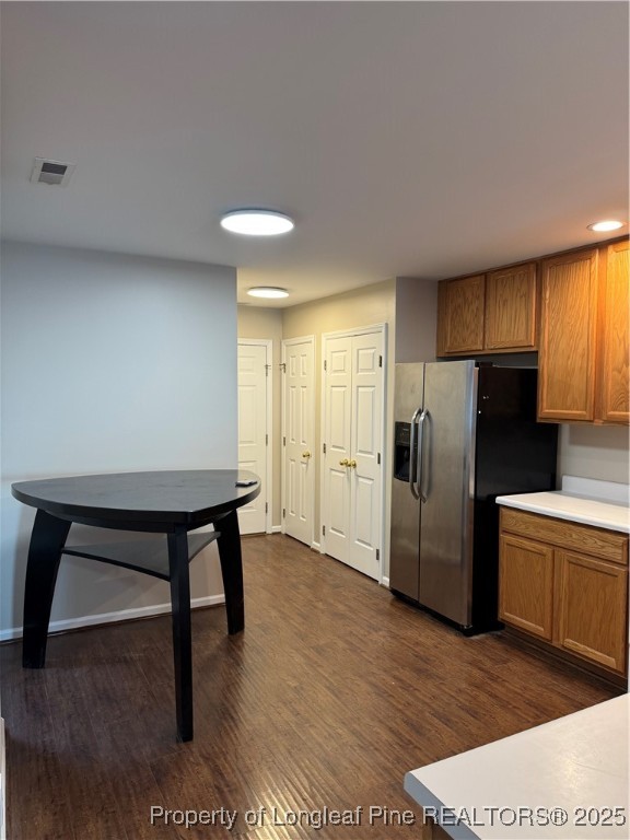116 Higher Learning Drive Durham, NC 27713 - Photo 10 of 32 a kitchen with stainless steel appliances a refrigerator and a stove top oven