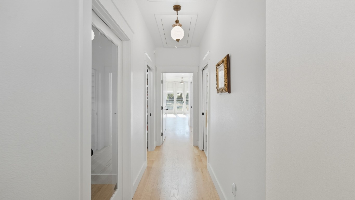 2656 River Bend Road Smithville, TX 78957 - Photo 15 of 40 a view of a hallway with wooden floor and staircase