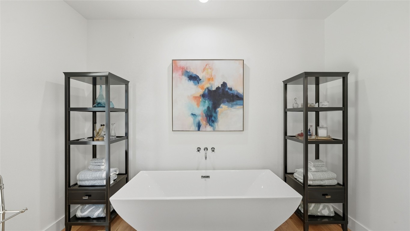 2656 River Bend Road Smithville, TX 78957 - Photo 17 of 40 a bathroom with a bathtub and a sink