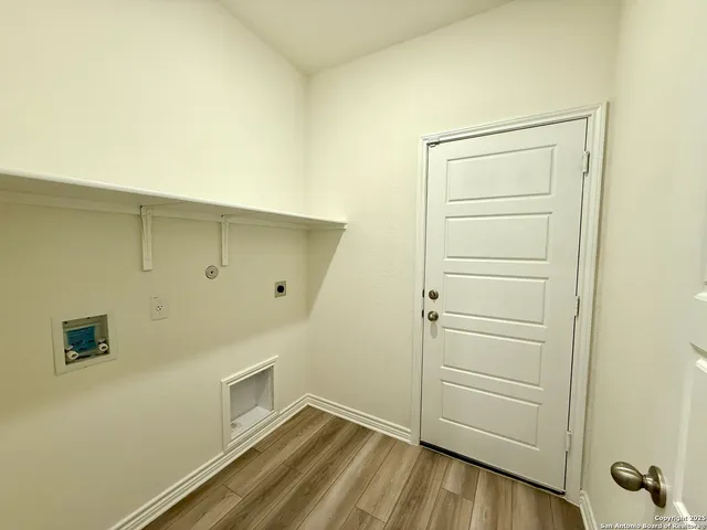 a bathroom with a sink toilet and mirror