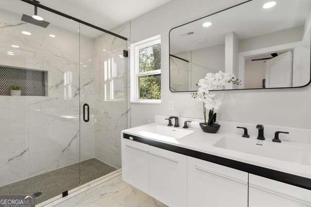 2461 Ridgefield Terrace Decatur, GA 30033 - Photo 7 of 15 a bathroom with a sink and a mirror