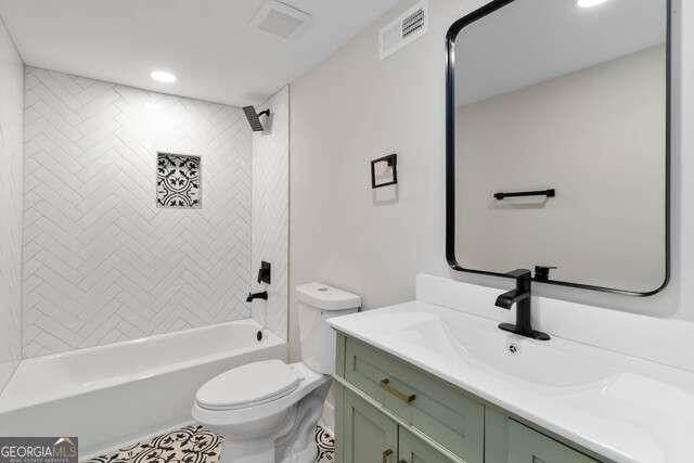 2461 Ridgefield Terrace Decatur, GA 30033 - Photo 9 of 15 a bathroom with a sink a toilet and a mirror