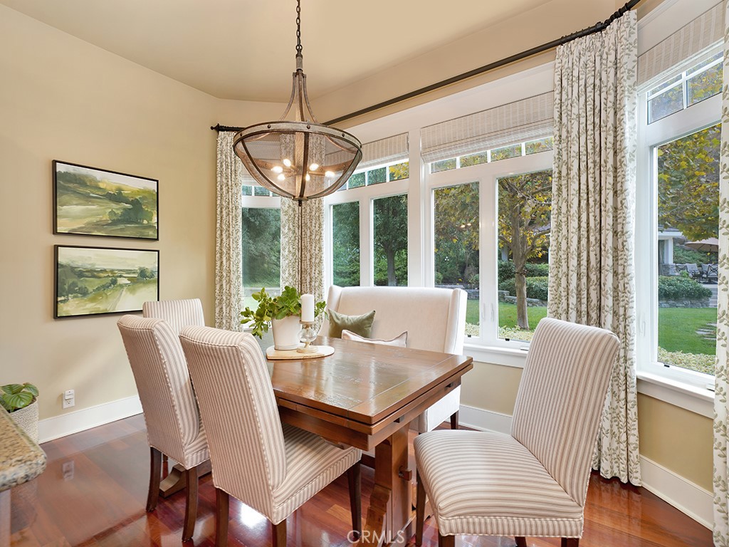 28291 Williams Canyon Road Silverado, CA 92676 - Photo 20 of 74 a view of a dining room with furniture wooden floor and chandelier