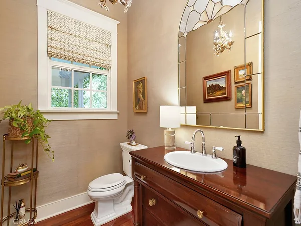 a spacious bedroom with a bed and a fireplace