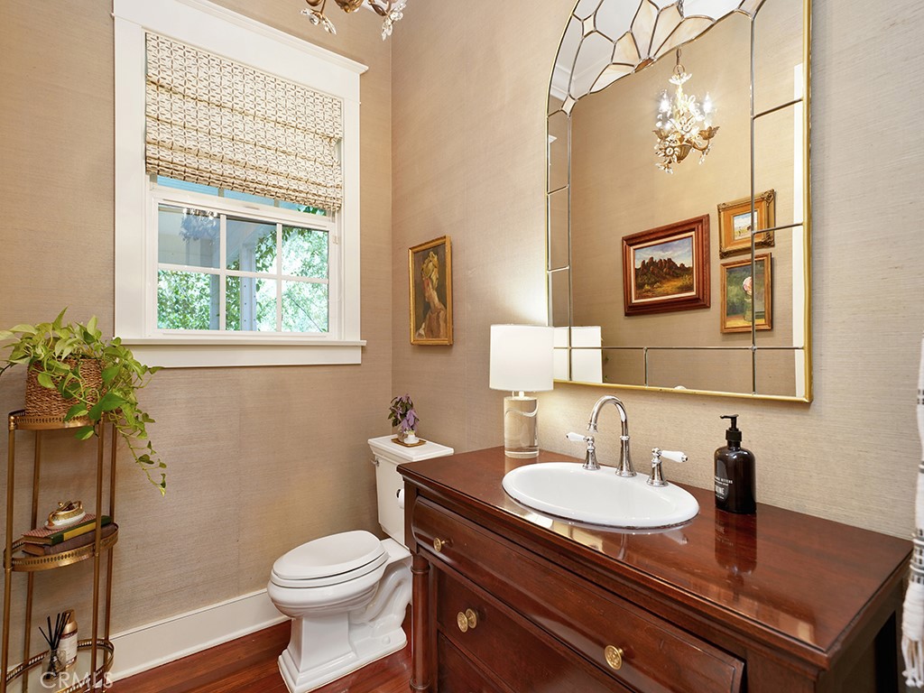 28291 Williams Canyon Road Silverado, CA 92676 - Photo 23 of 74 a bathroom with a granite countertop sink toilet and a mirror
