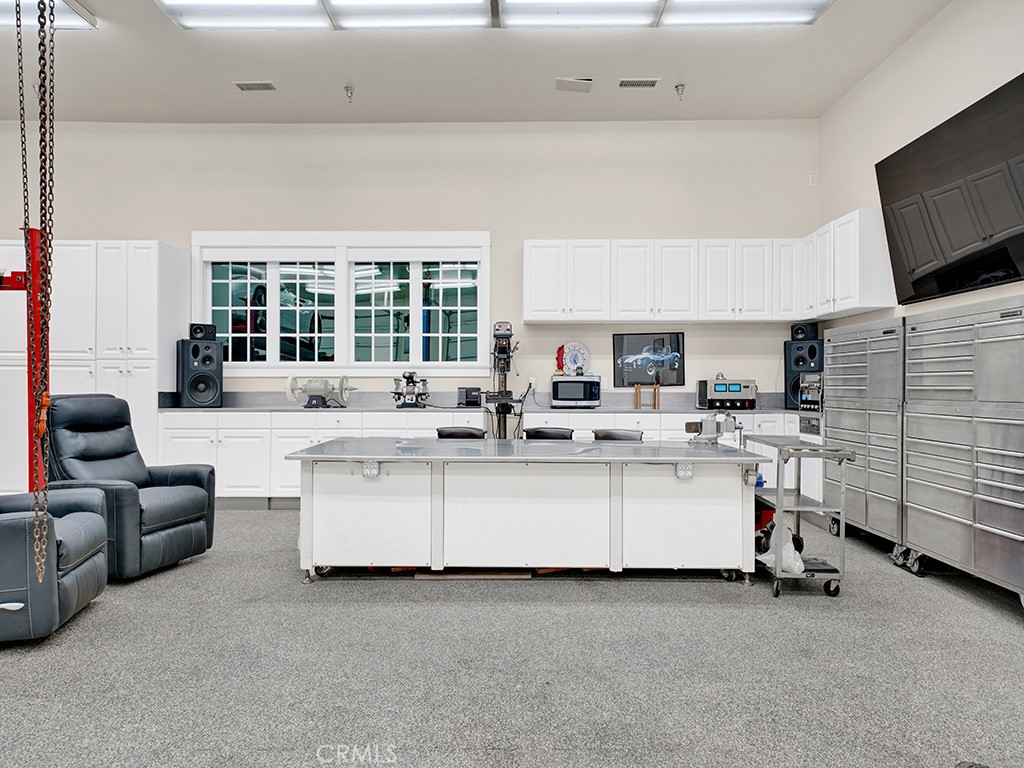 28291 Williams Canyon Road Silverado, CA 92676 - Photo 49 of 74 a living room with fireplace furniture and a flat screen tv