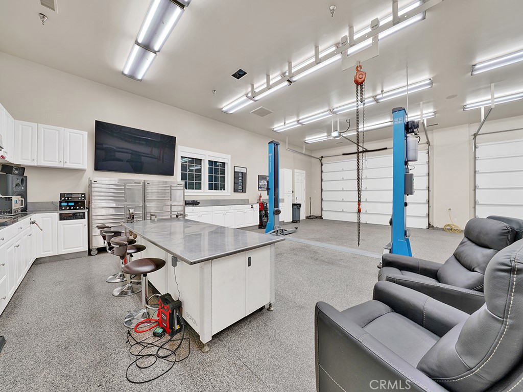 28291 Williams Canyon Road Silverado, CA 92676 - Photo 50 of 74 a living room with furniture gym equipment and a view of kitchen