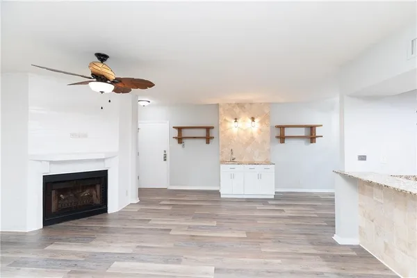 a room with view of wooden floor and cabinet