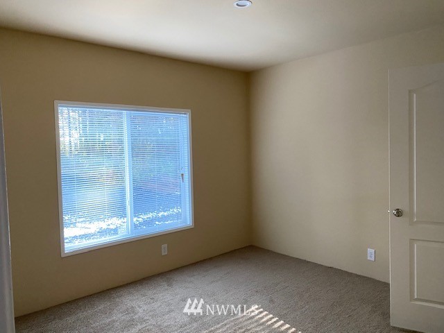 156 Nelson Road Winlock, WA 98596 - Photo 11 of 19 a view of an empty room with a window