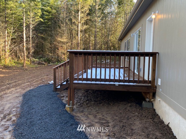 156 Nelson Road Winlock, WA 98596 - Photo 14 of 19 a view of balcony with wooden floor and fence