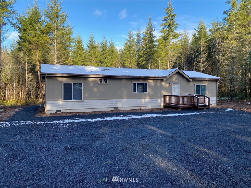 156 Nelson Road Winlock, WA 98596 - Photo 19 of 19 a front view of a house with a garden