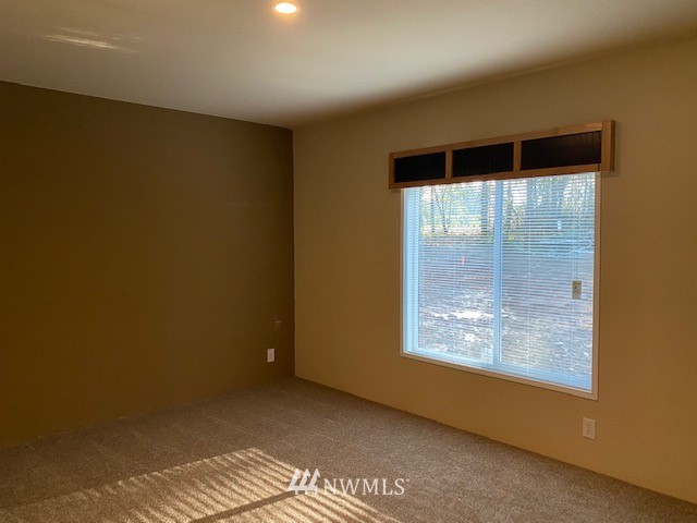 156 Nelson Road Winlock, WA 98596 - Photo 8 of 19 a view of an empty room with a window