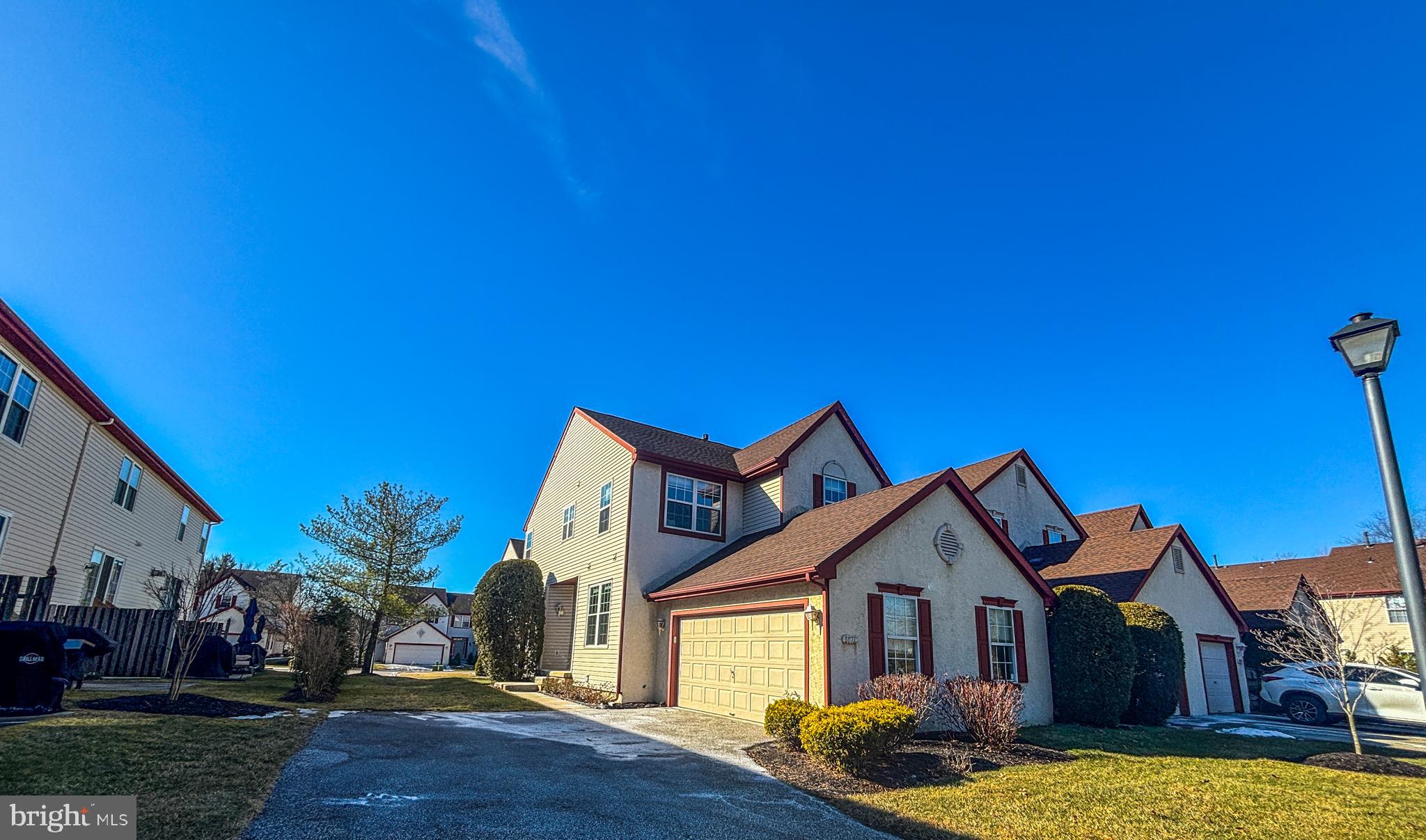 1071 Chanticleer Cherry Hill, NJ 08003 - Photo 1 of 18 a view of a house with wooden fence
