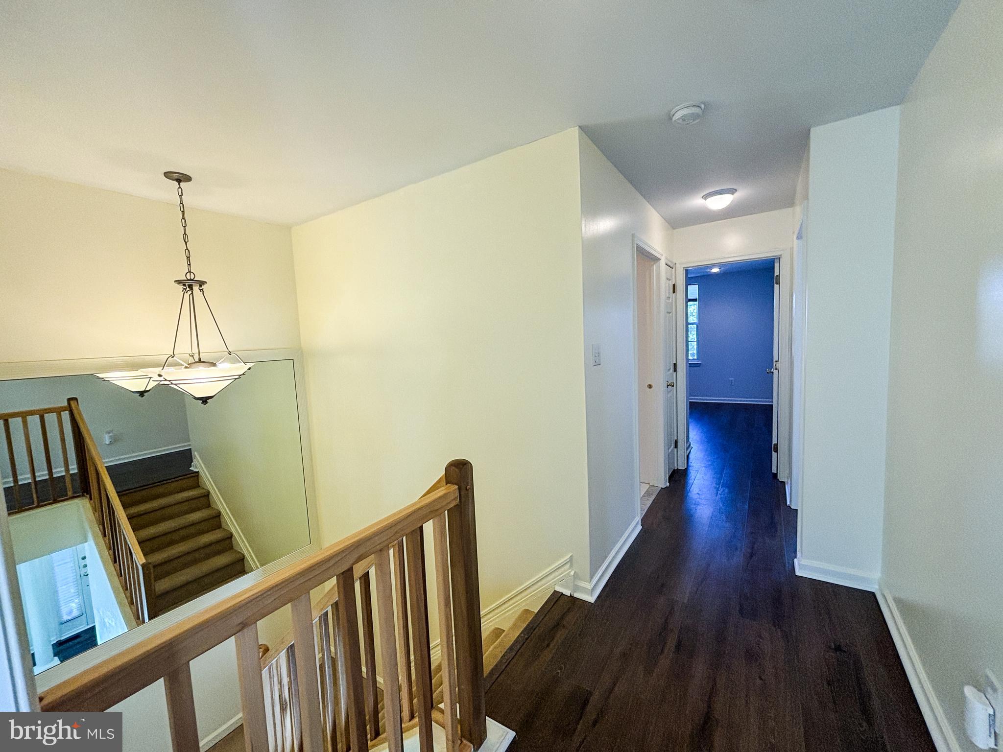 1071 Chanticleer Cherry Hill, NJ 08003 - Photo 11 of 18 a view of a hallway with wooden floor