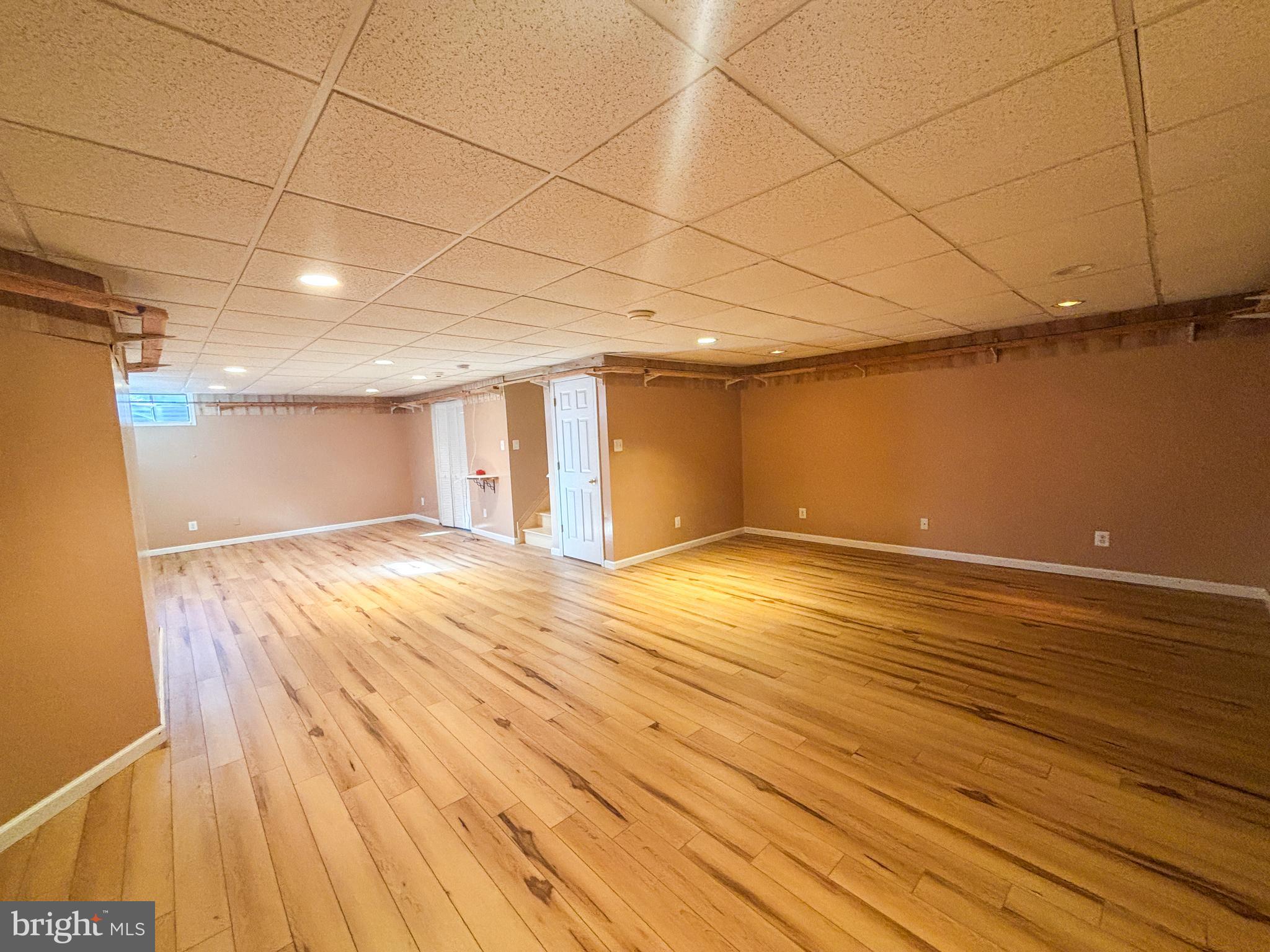 1071 Chanticleer Cherry Hill, NJ 08003 - Photo 16 of 18 a view of empty room with wooden floor