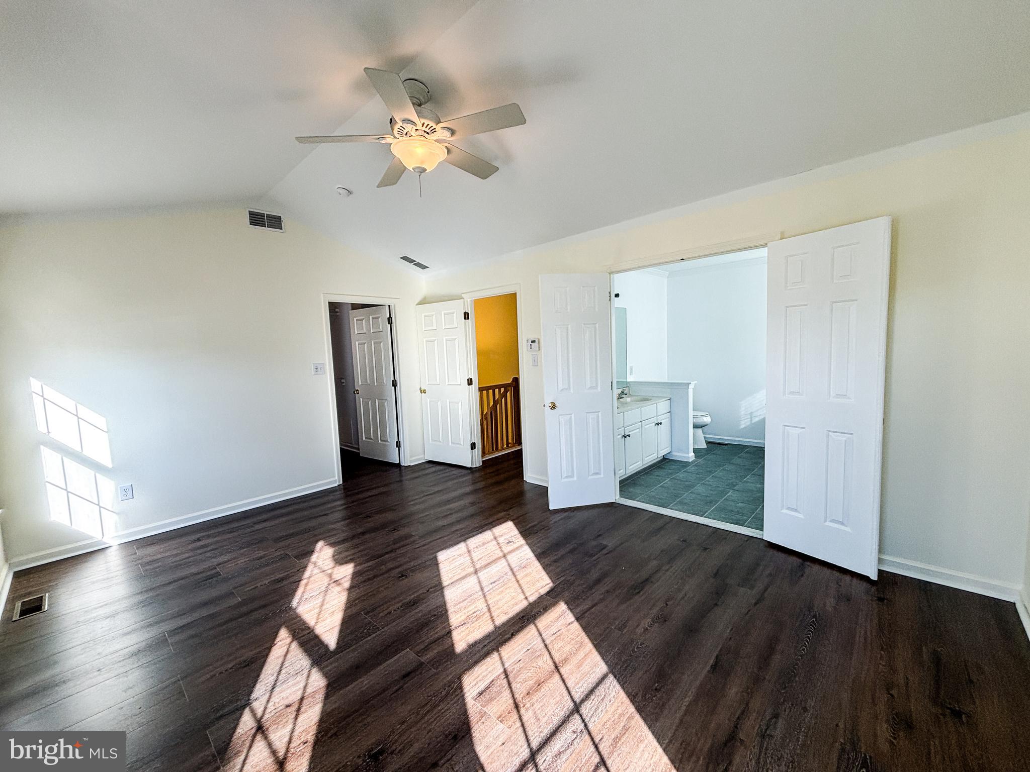 1071 Chanticleer Cherry Hill, NJ 08003 - Photo 7 of 18 a view of an empty room and wooden floor