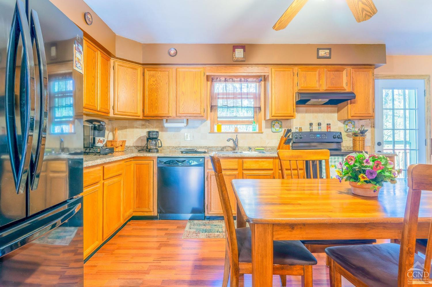 1831 Sleepy Hollow Road, Unit VV50 Athens, NY 12015 - Photo 14 of 42 a kitchen with stainless steel appliances granite countertop a stove and a refrigerator