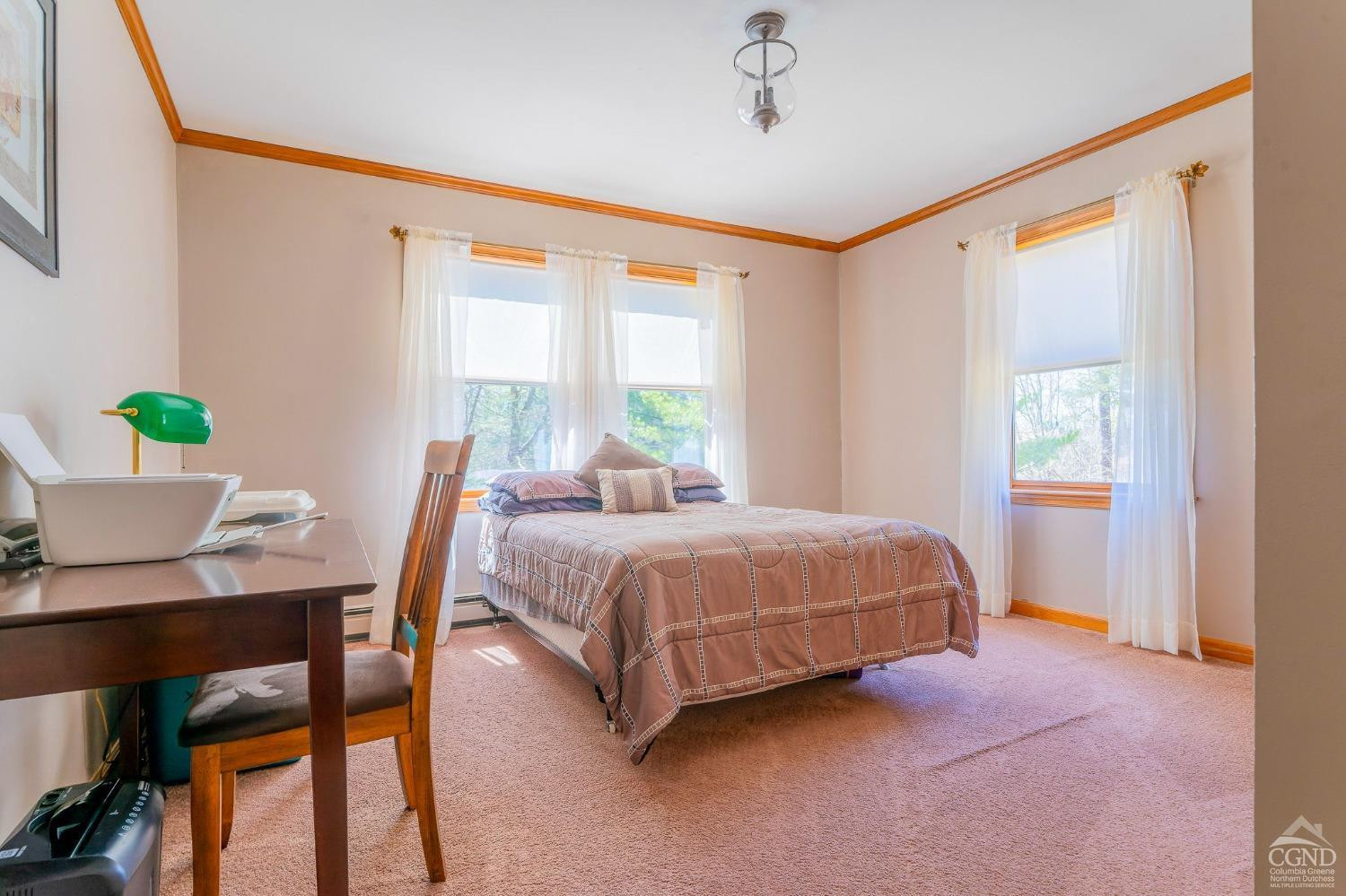 1831 Sleepy Hollow Road, Unit VV50 Athens, NY 12015 - Photo 27 of 42 a bedroom with a bed and a table