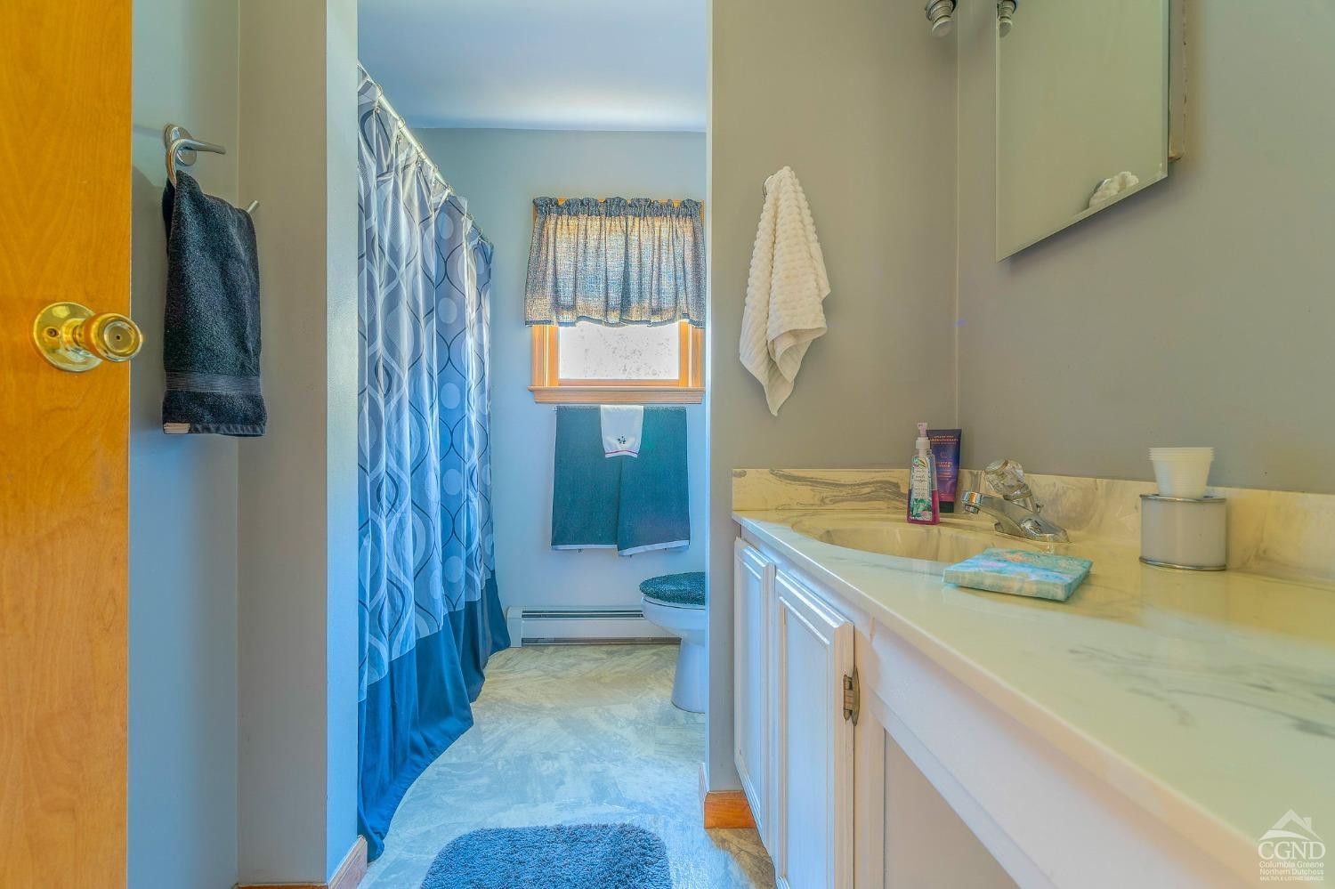 1831 Sleepy Hollow Road, Unit VV50 Athens, NY 12015 - Photo 30 of 42 a bathroom with a sink a toilet and shower