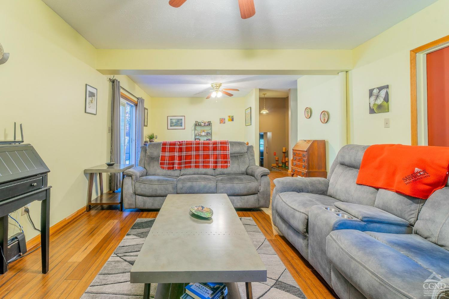 1831 Sleepy Hollow Road, Unit VV50 Athens, NY 12015 - Photo 31 of 42 a living room with furniture a flat screen tv and a table