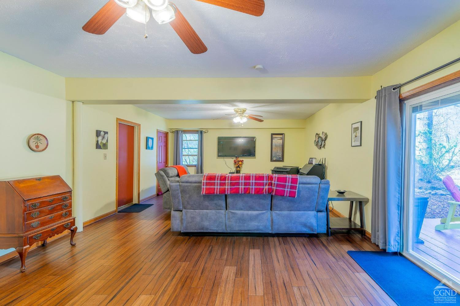 1831 Sleepy Hollow Road, Unit VV50 Athens, NY 12015 - Photo 32 of 42 a living room with furniture and wooden floor
