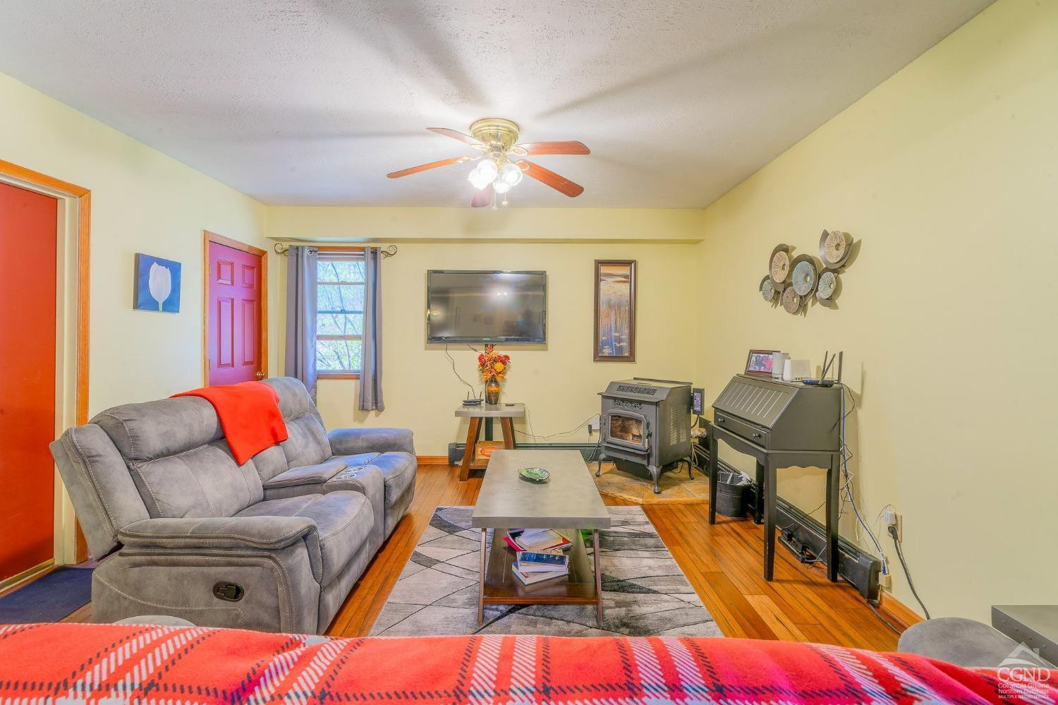 1831 Sleepy Hollow Road, Unit VV50 Athens, NY 12015 - Photo 34 of 42 a living room with furniture and a flat screen tv