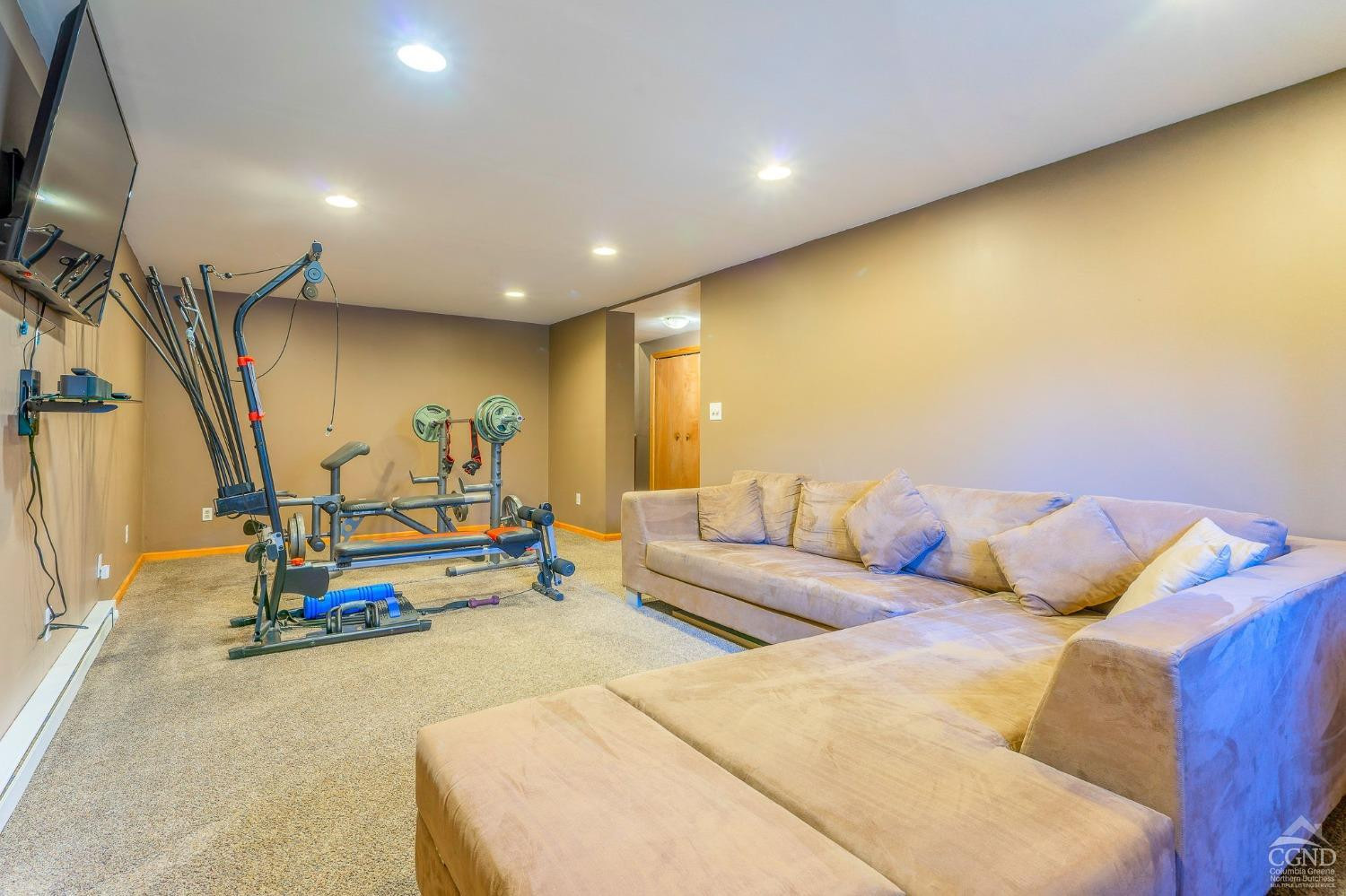 1831 Sleepy Hollow Road, Unit VV50 Athens, NY 12015 - Photo 39 of 42 a living room with furniture and a flat screen tv