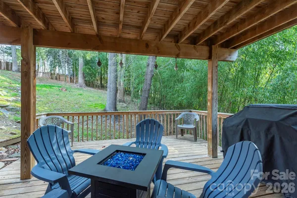 a view of porch with a table and a chairs