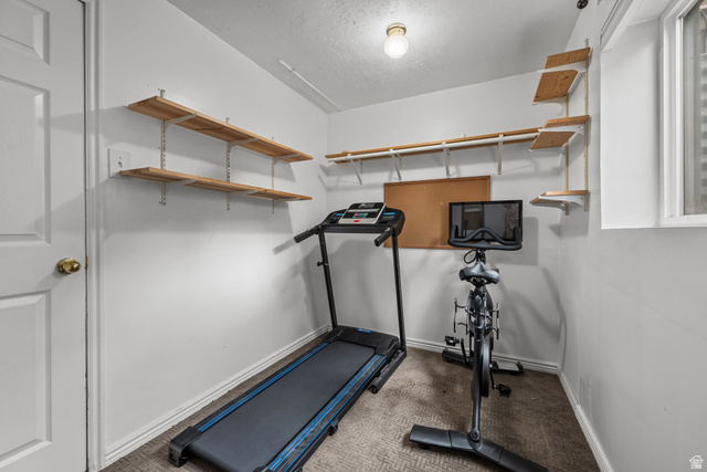 7659 State Street Midvale, UT 84047 - Photo 21 of 33 Dedicated room featuring light-colored walls and carpet flooring