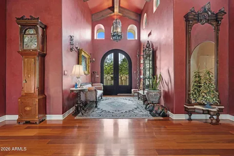 a living room with fireplace furniture and a window