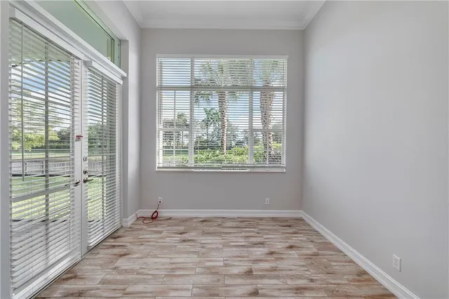 a bathroom with a shower a sink and a mirror