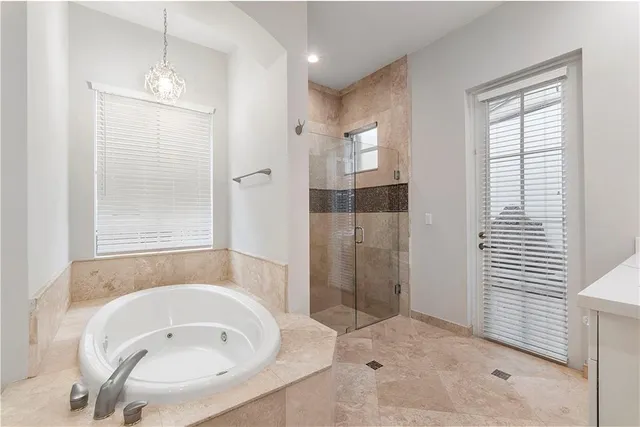 a view of a house with a yard and plants