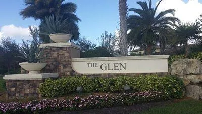a view of a swimming pool with a patio