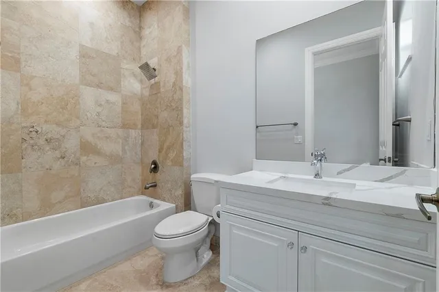 a view of a white house with a yard and plants