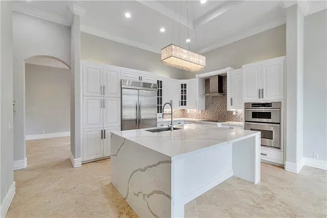 an empty room with windows and outdoor view