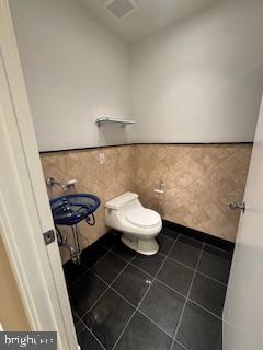 1203 31st Street Northwest, Unit 1 Washington, DC 20007 - Photo 8 of 14 Modern restroom with elegant tiles.