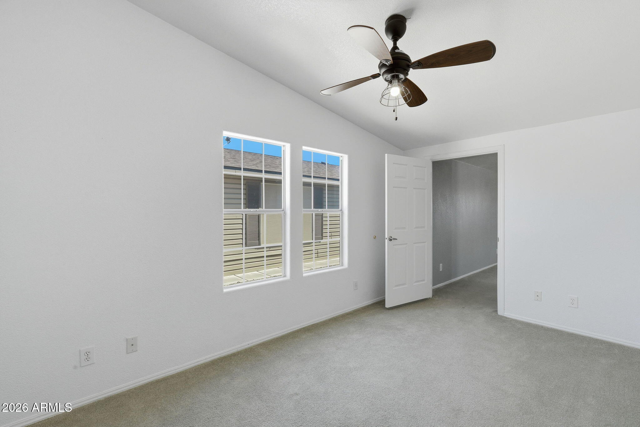 3301 South Goldfield Road, Unit 1015 Apache Junction, AZ 85119 - Photo 19 of 34 a view of an empty room with a window