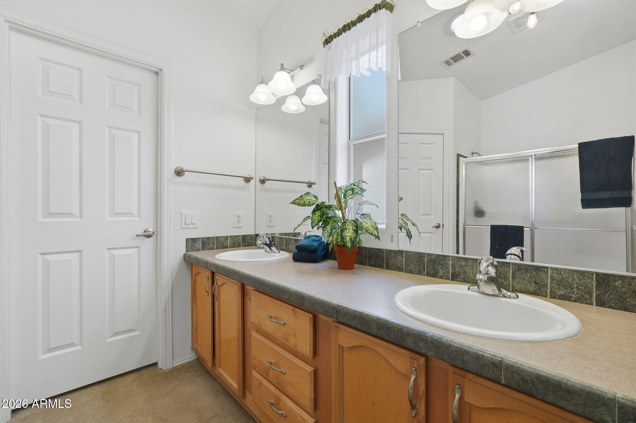 3301 South Goldfield Road, Unit 1015 Apache Junction, AZ 85119 - Photo 24 of 34 a bathroom with a sink and a mirror