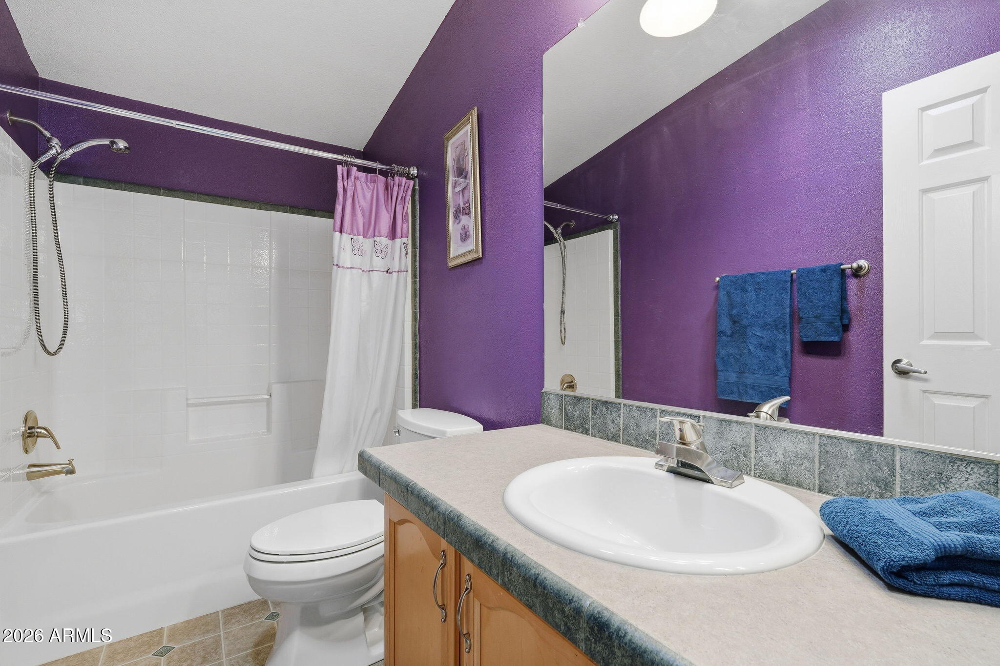 3301 South Goldfield Road, Unit 1015 Apache Junction, AZ 85119 - Photo 27 of 34 a bathroom with a sink a toilet a tub and shower