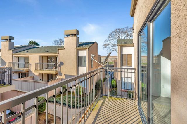 a view of a building from a balcony