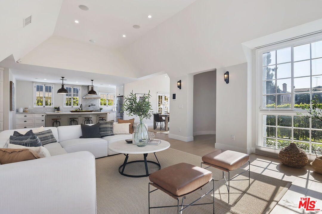 6507 West Olympic Boulevard Los Angeles, CA 90048 - Photo 11 of 50 a living room with furniture and a window