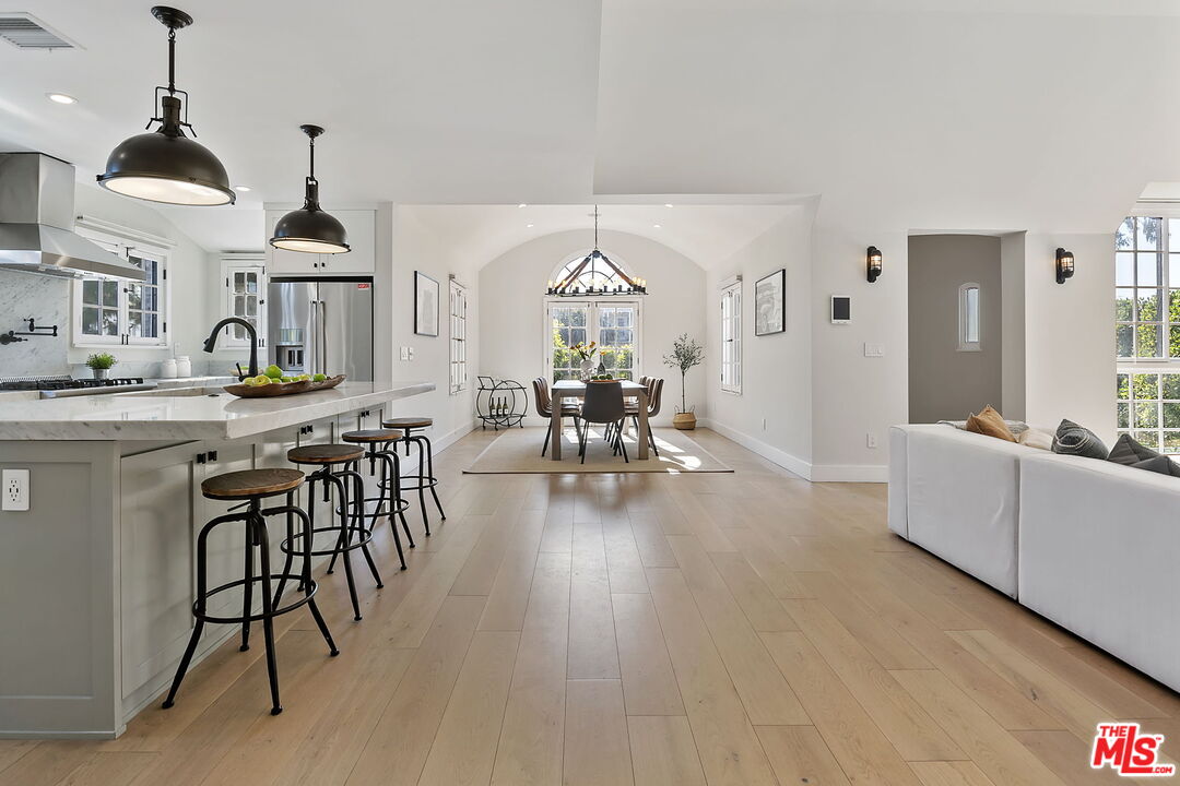 6507 West Olympic Boulevard Los Angeles, CA 90048 - Photo 13 of 50 a view of a dining room with furniture window and wooden floor