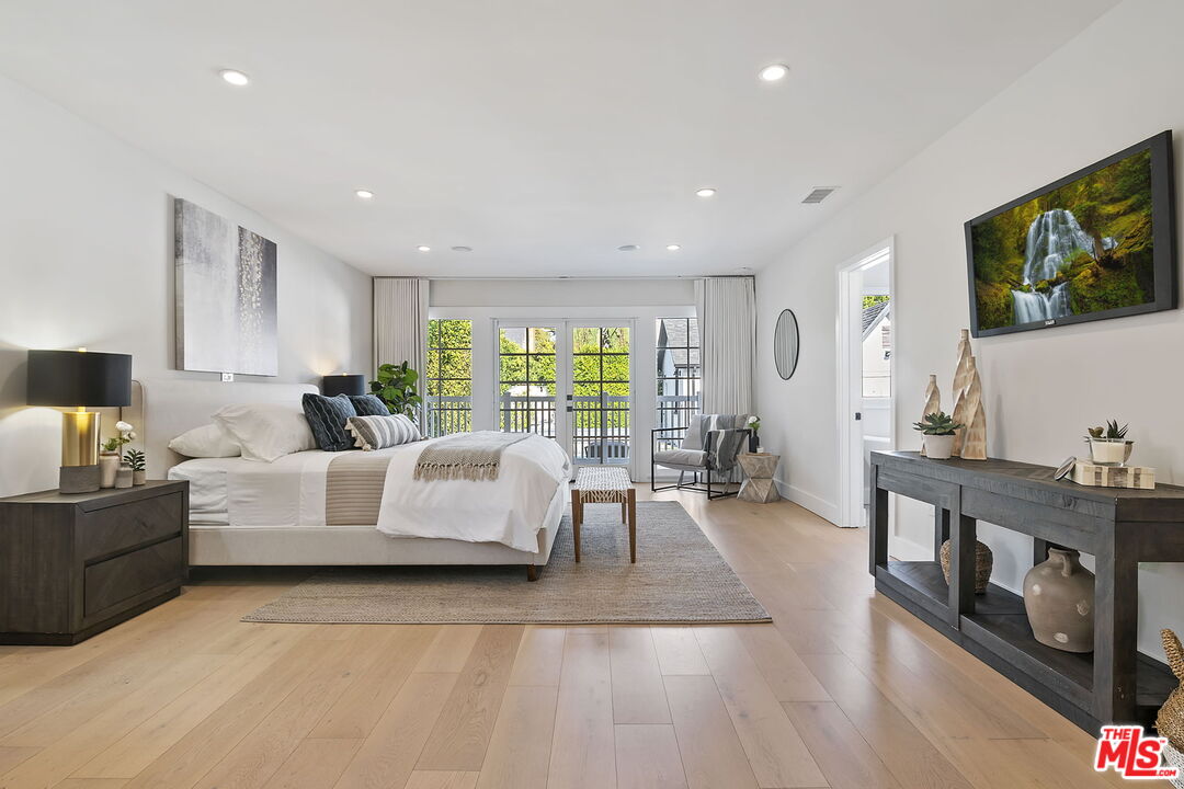 6507 West Olympic Boulevard Los Angeles, CA 90048 - Photo 22 of 50 a living room with furniture and a flat screen tv