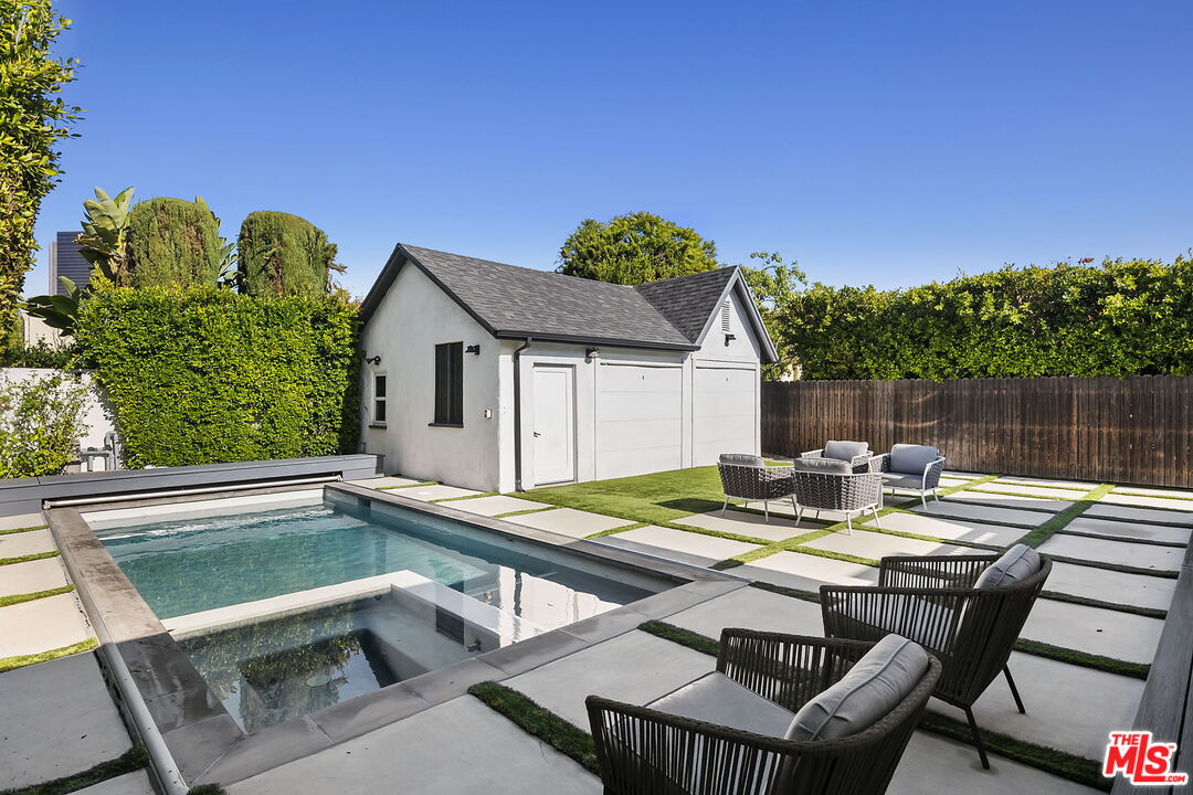 6507 West Olympic Boulevard Los Angeles, CA 90048 - Photo 36 of 50 a view of house with backyard and outdoor seating