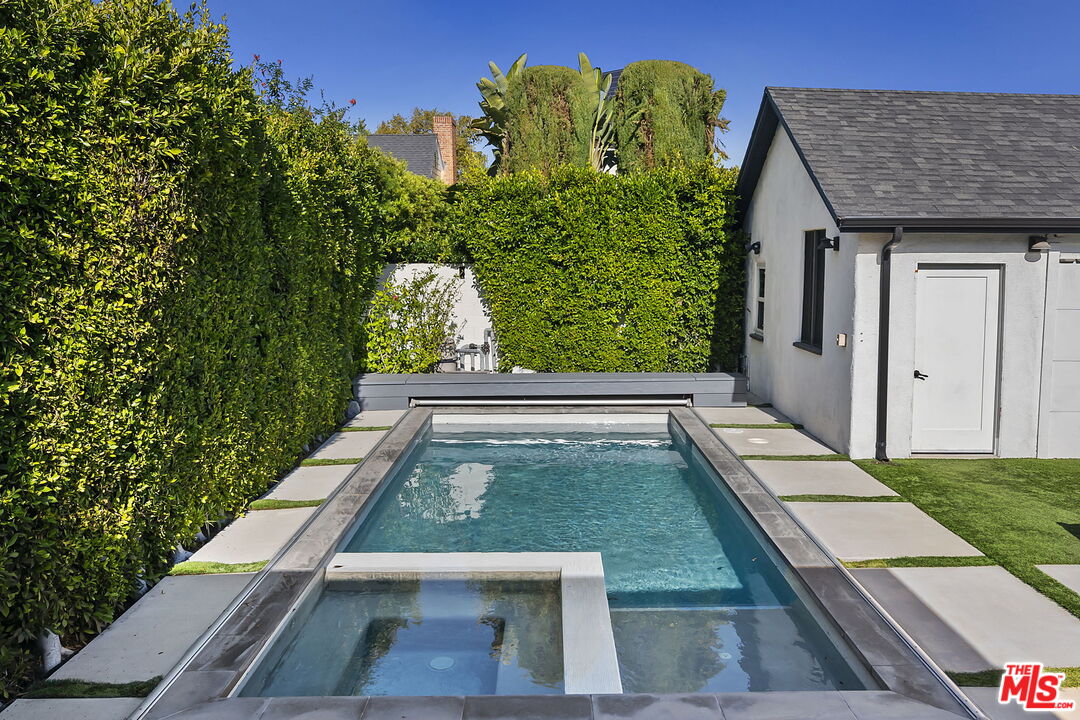 6507 West Olympic Boulevard Los Angeles, CA 90048 - Photo 42 of 50 a view of a backyard with pool