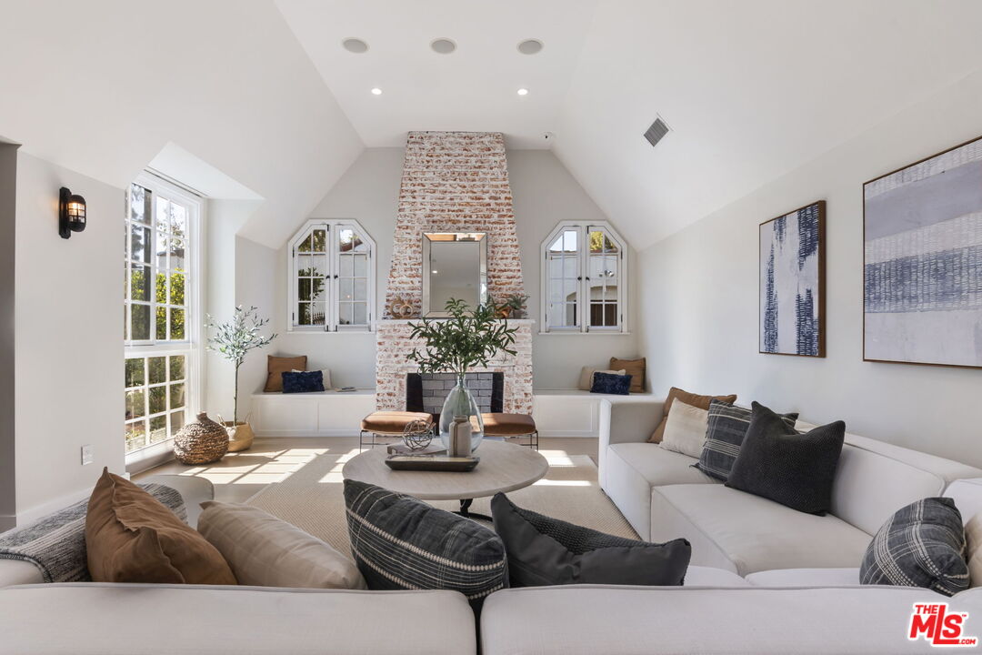 6507 West Olympic Boulevard Los Angeles, CA 90048 - Photo 10 of 50 a living room with furniture kitchen and a large window