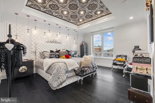 a bed room with a bed and a window