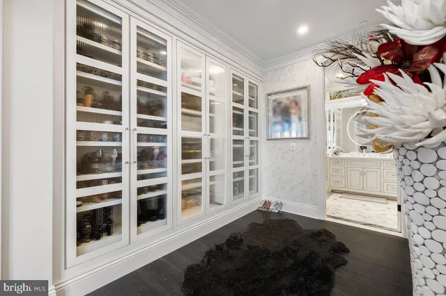 a bathroom with mirror and