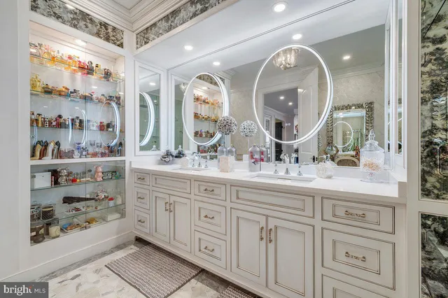 a bathroom with a glass shower door