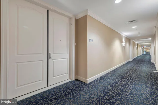 a view of a hallway with entryway